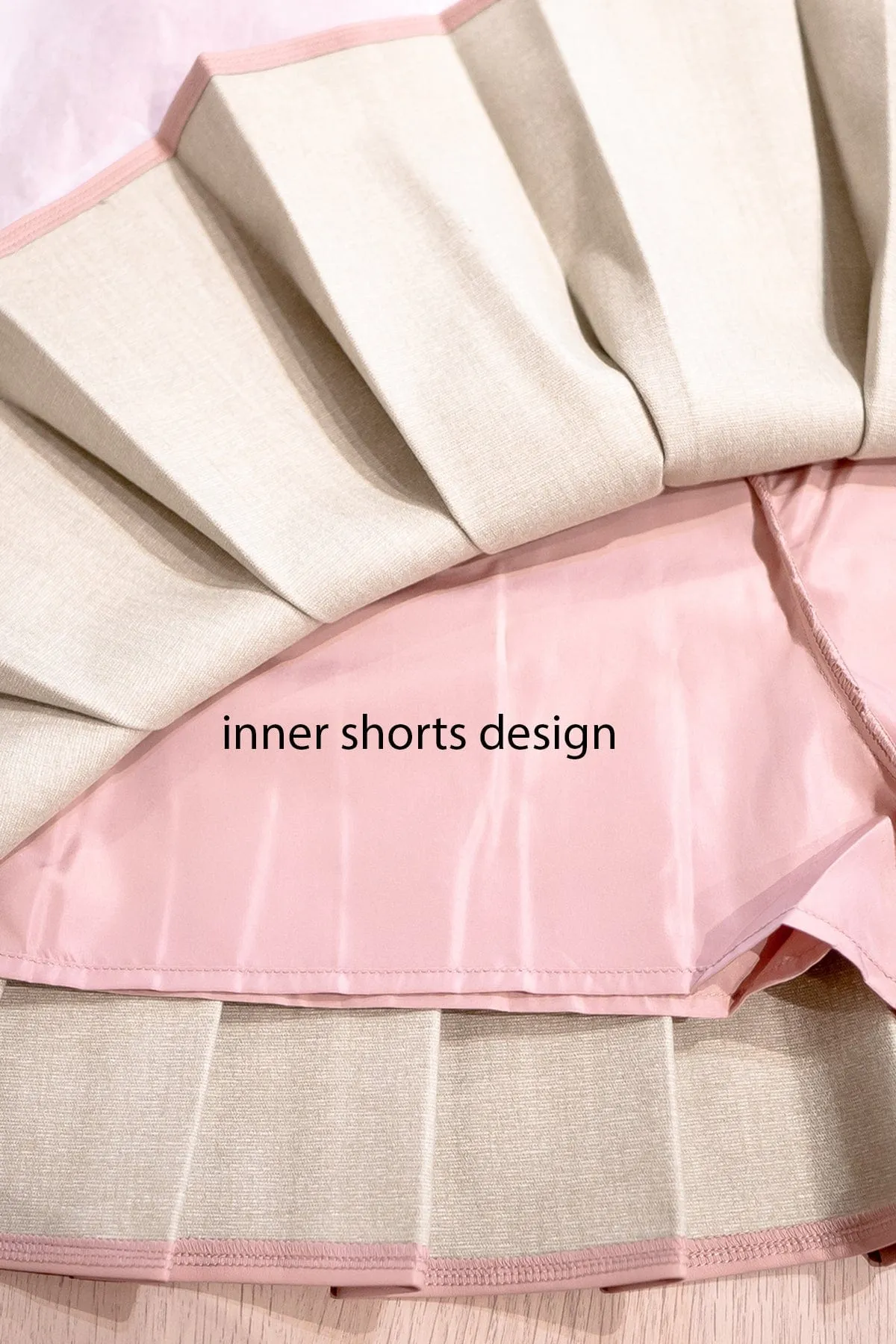 REMY PLEATED LEATHER SKORTS IN KHAKI